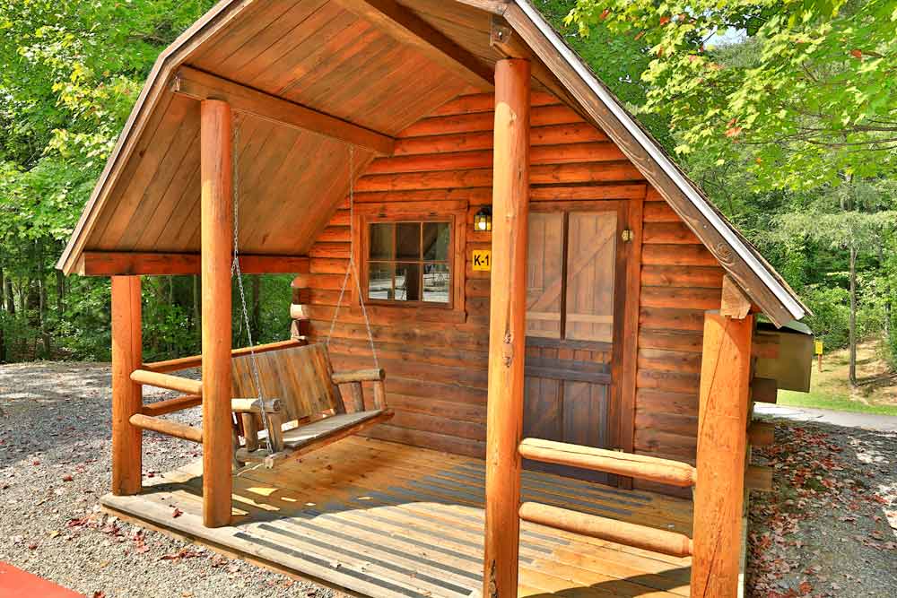 Close up image of one of our cozy camping cabin at Asheville West KOA