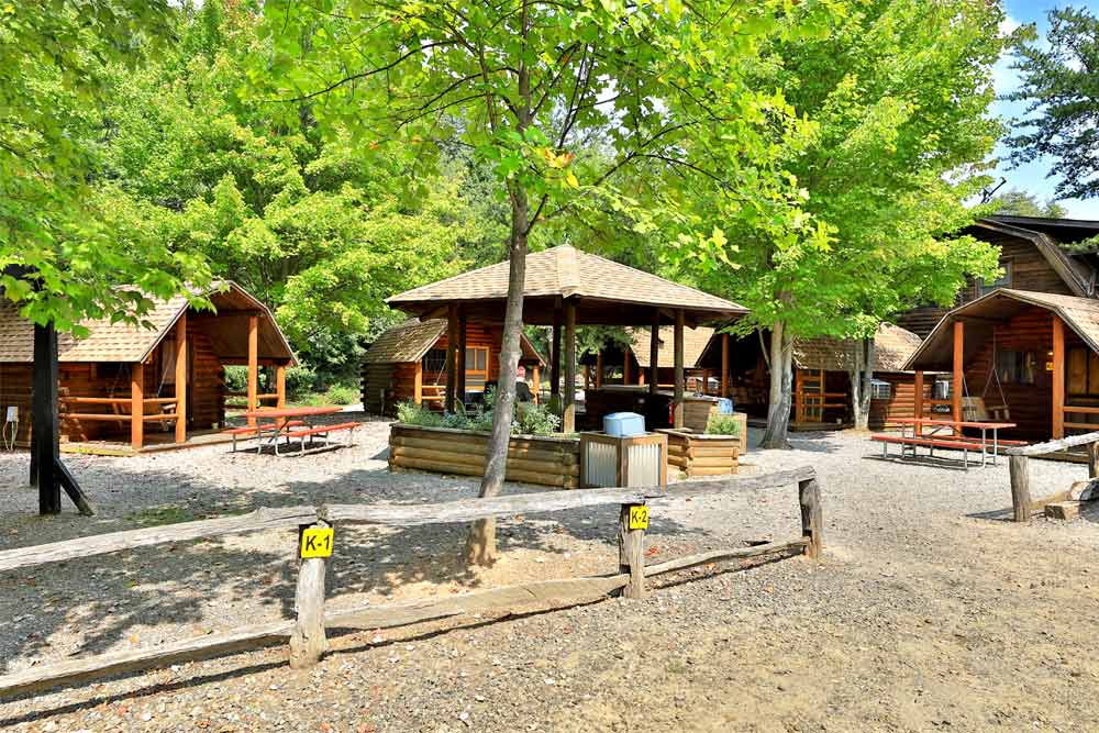 The camping village is built around a covered, outdoor camping kitchen.